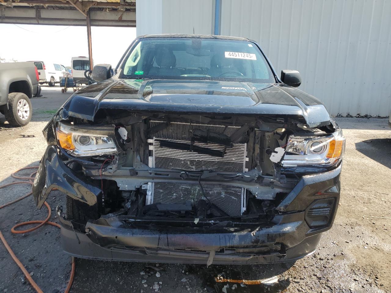 2021 GMC Canyon VIN 1GTG5BEN4M1257114 Copart auction photo, front end damage thumbnail 5