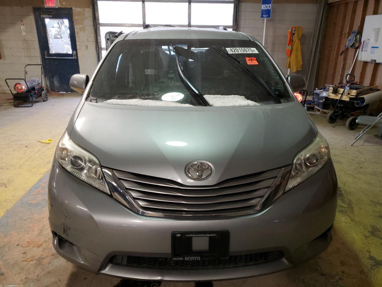 2015 Toyota Sienna VIN 5TDKK3DC5FS670562 Copart auction photo, biohazard/chemical / all over damage thumbnail 5
