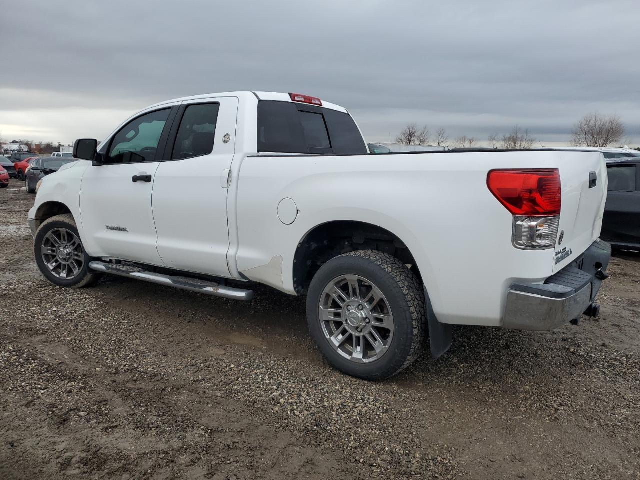 2013 Toyota Tundra VIN 5TFRM5F17DX062002 Copart auction photo, rear end / minor dent/scratches damage thumbnail 2