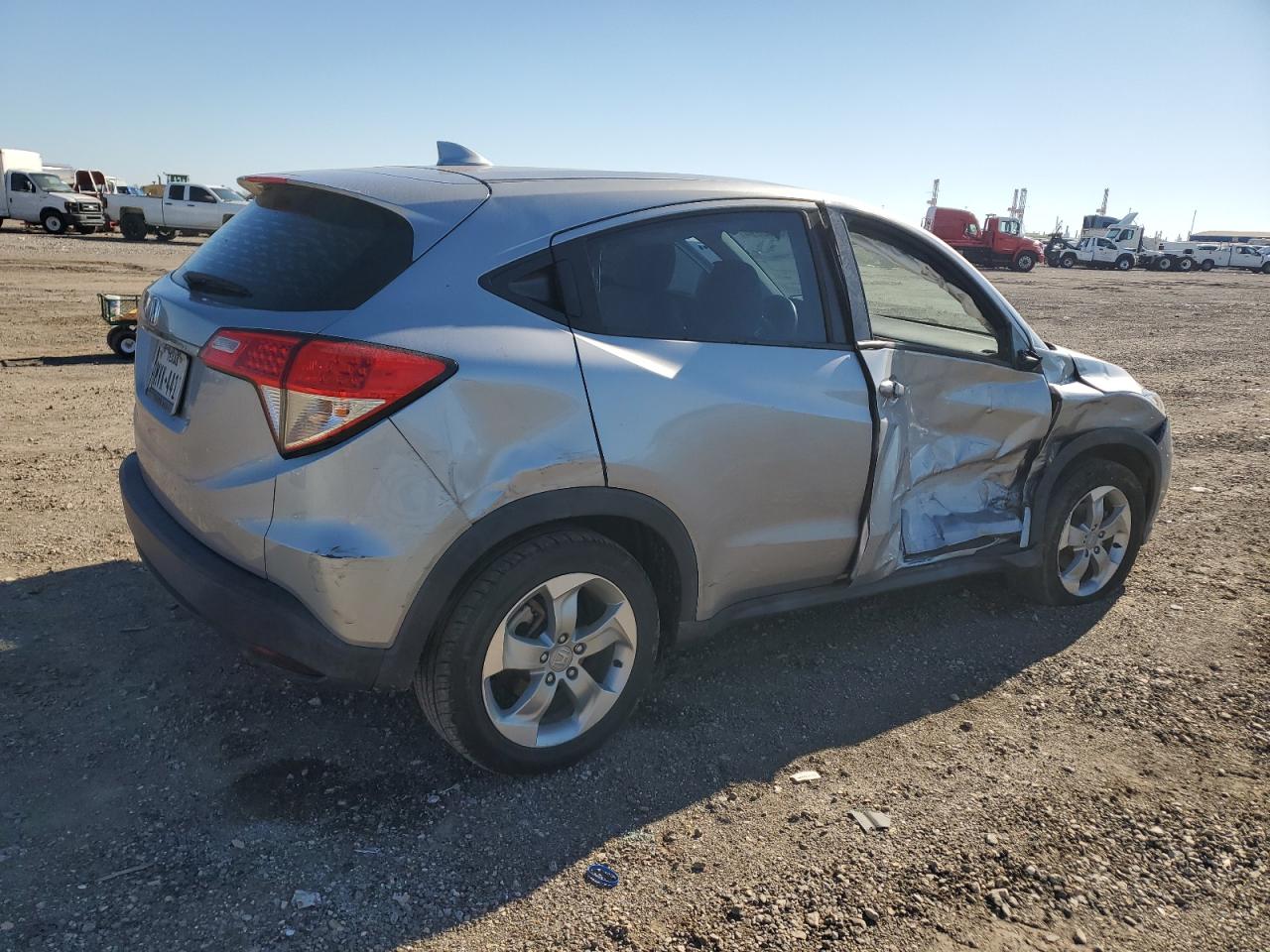 2019 Honda HR-V VIN 3CZRU5H32KG711909 Copart auction photo, side / front end damage thumbnail 3
