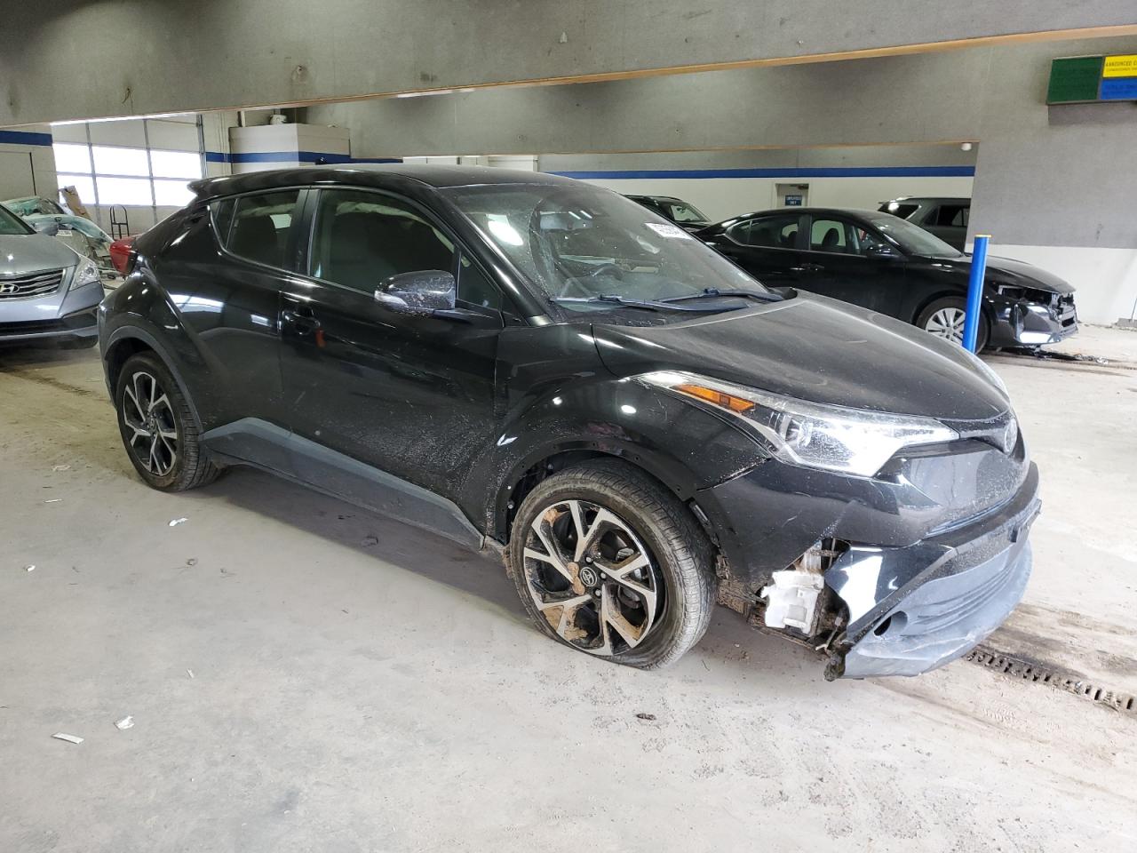 2018 Toyota C-HR VIN JTNKHMBX4J1007155 Copart auction photo, front end / side damage thumbnail 4