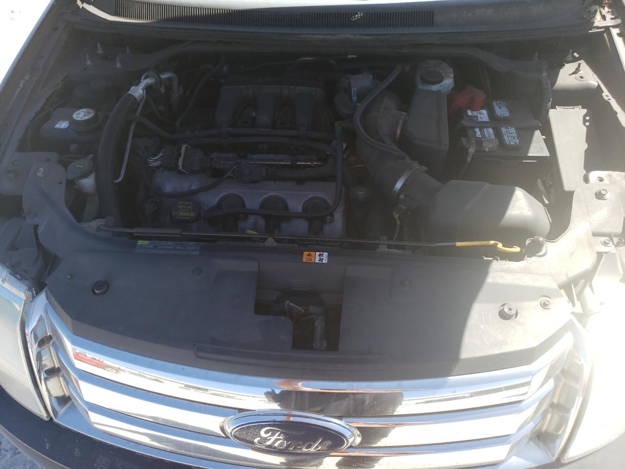 2009 Ford Taurus VIN 1FMDK07W69GA02941 Copart auction photo, rear end damage thumbnail 12