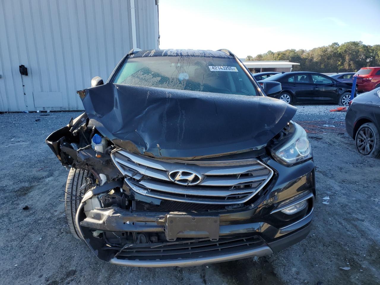 2017 Hyundai Santa Fe VIN 5XYZU3LB6HG399979 Copart auction photo, front end damage thumbnail 5