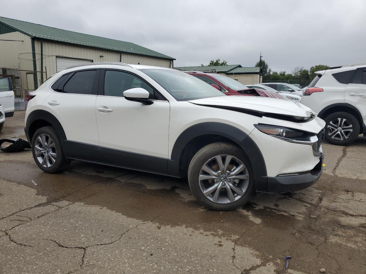 2023 Mazda CX-30 VIN 3MVDMBDM6PM516321 Copart auction photo, all over damage thumbnail 4