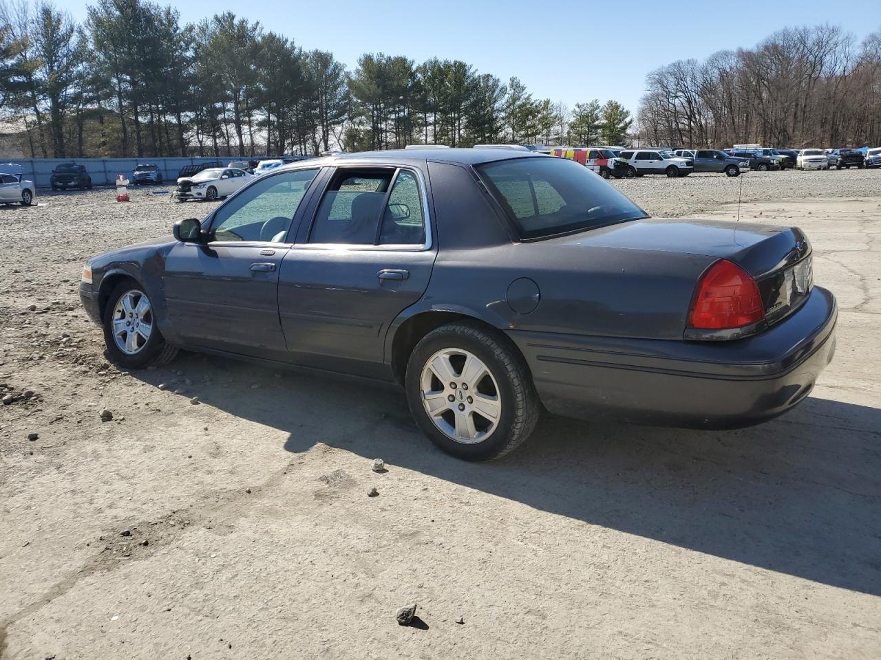 2005 Ford Crown Victoria VIN 2FAHP74WX5X110509 Copart auction photo, side / front end damage thumbnail 2