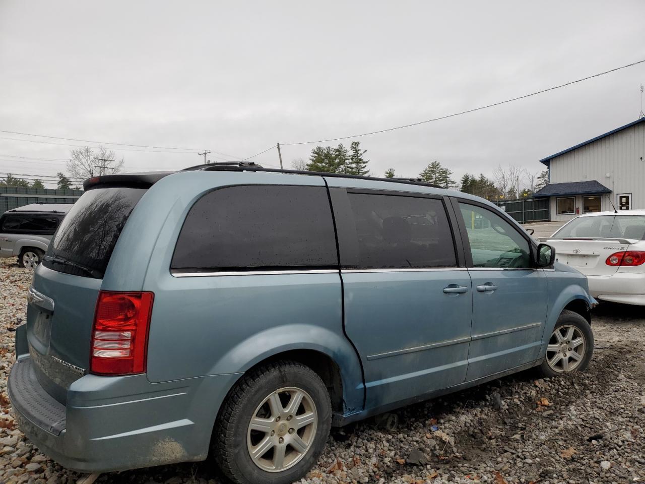 2010 Chrysler Town & Country VIN 2A4RR2D15AR400293 Copart auction photo, front end / minor dent/scratches damage thumbnail 3