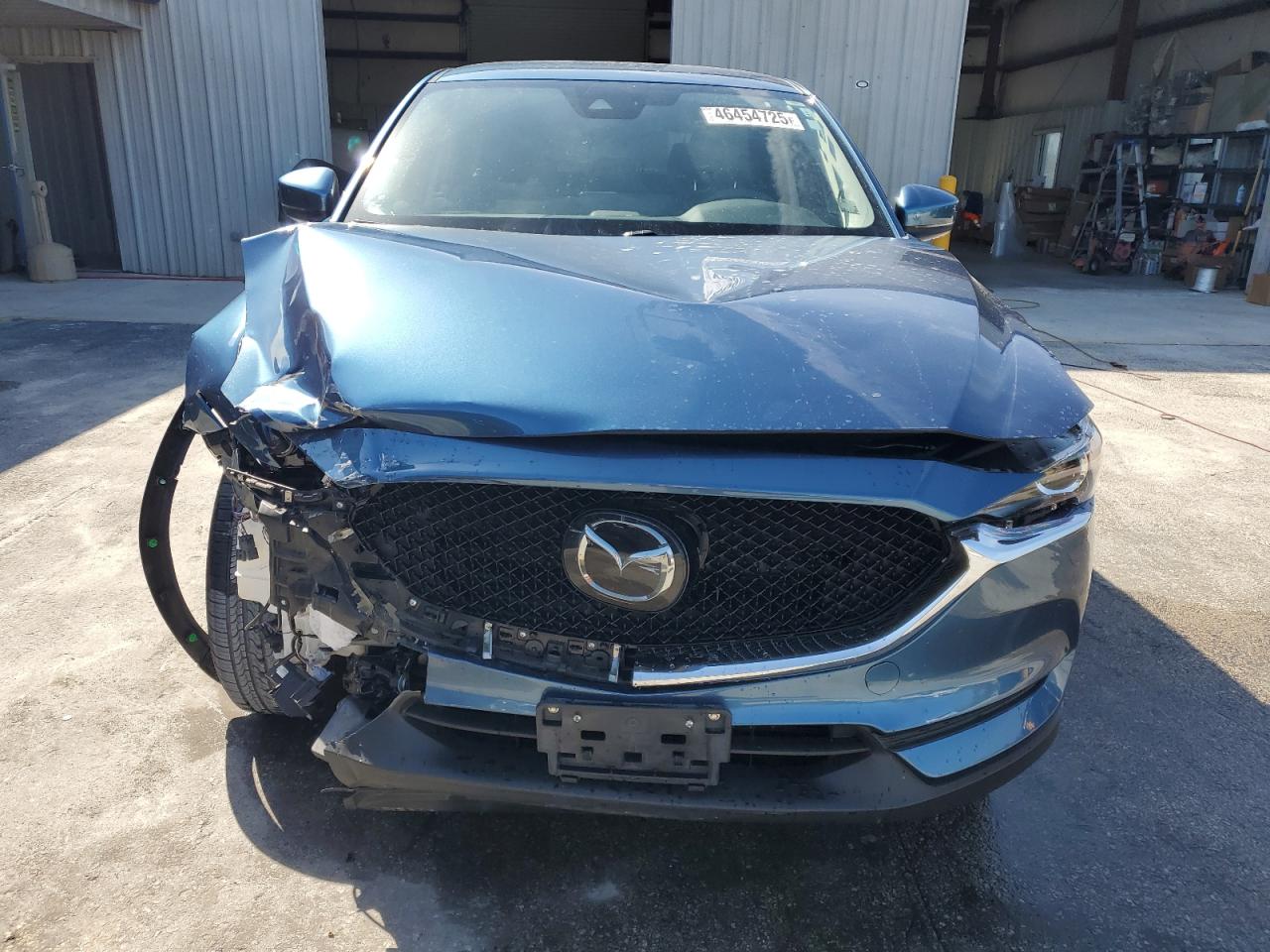 2021 Mazda CX-5 VIN JM3KFBCM2M0446925 Copart auction photo, front end / minor dent/scratches damage thumbnail 5
