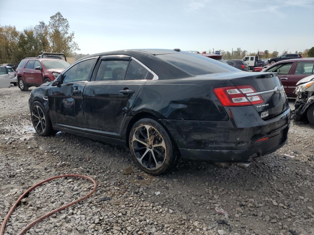2015 Ford Taurus VIN 1FAHP2H80FG148157 Copart auction photo, rollover damage thumbnail 2