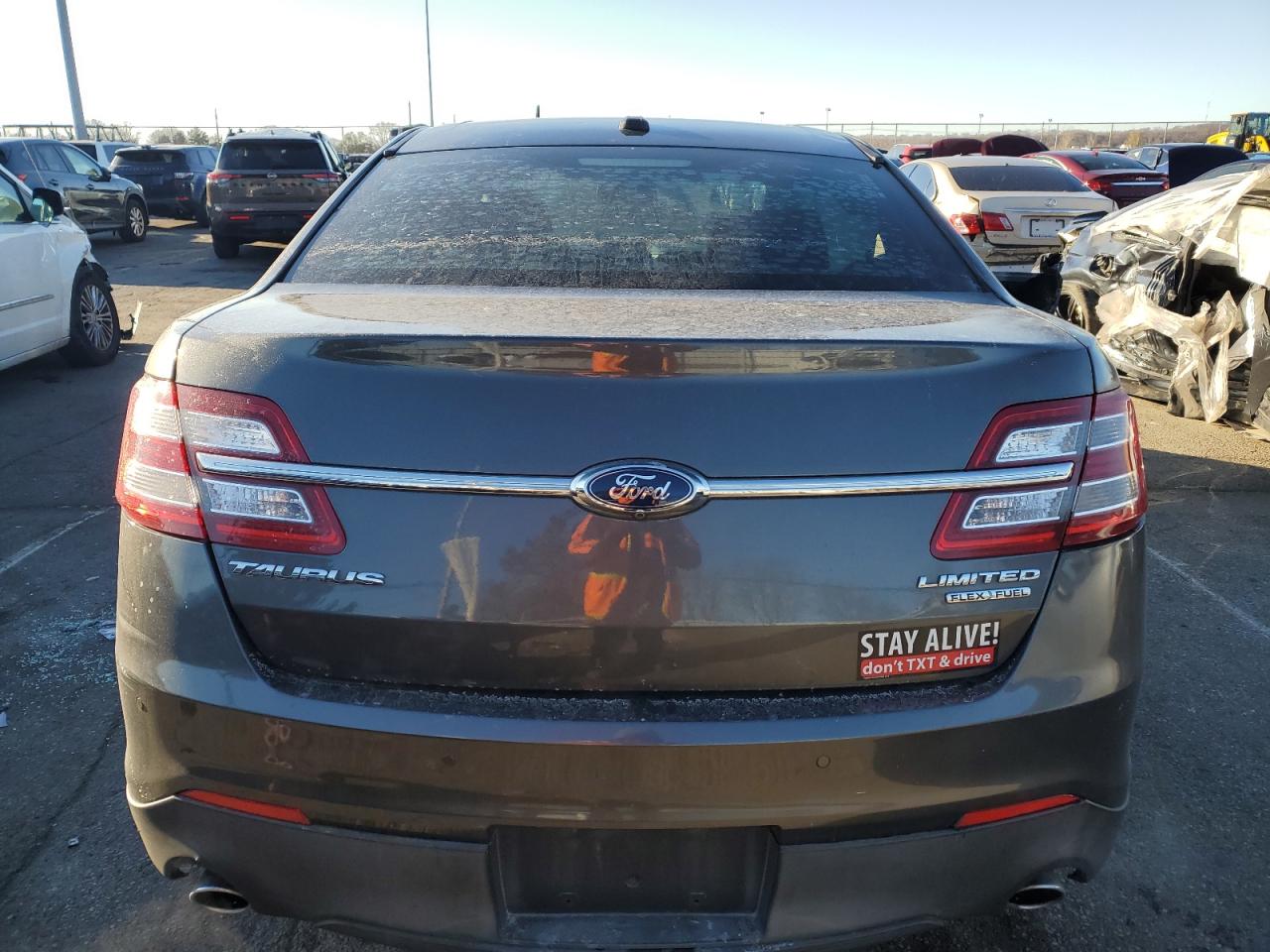 2015 Ford Taurus VIN 1FAHP2F84FG127511 Copart auction photo, all over damage thumbnail 6