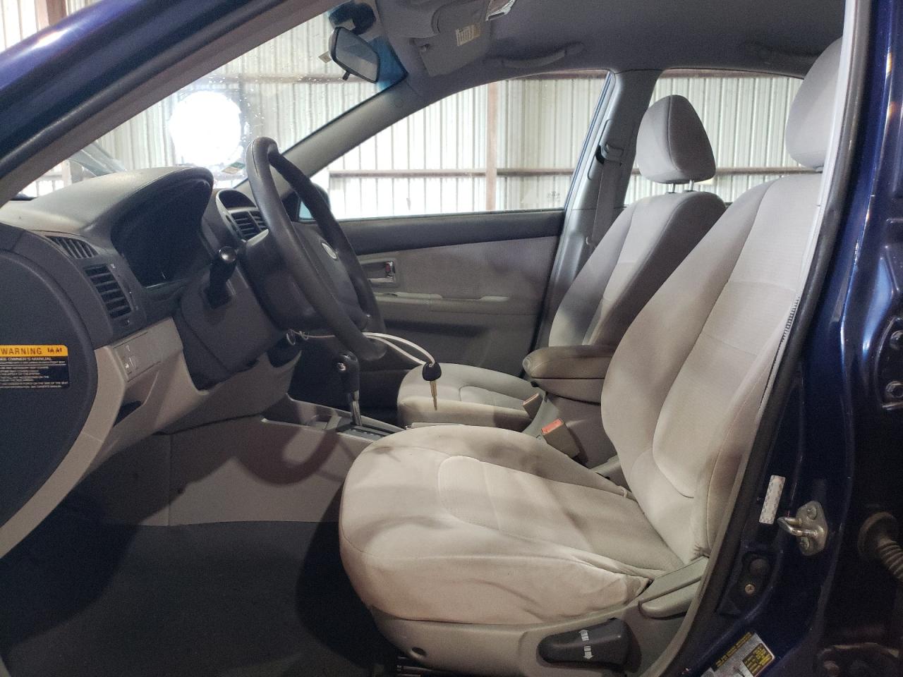 2007 KIA Spectra VIN KNAFE121275486747 Copart auction photo, water/flood / all over damage thumbnail 7