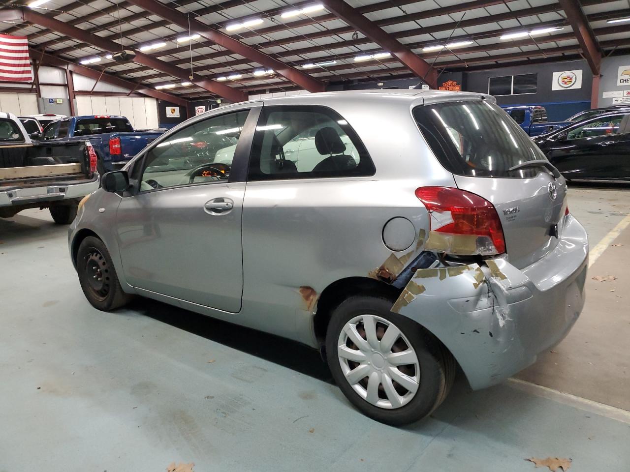 2009 Toyota Yaris VIN JTDJT903495232031 Copart auction photo, rear end / front end damage thumbnail 2
