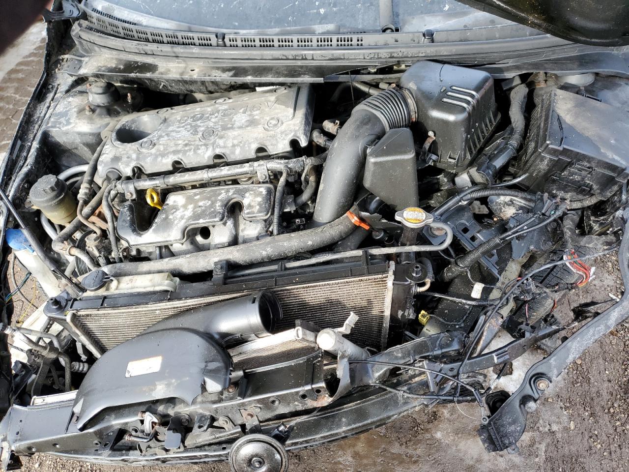 2010 KIA Forte VIN KNAFU4A2XA5231432 Copart auction photo, rollover / all over damage thumbnail 11