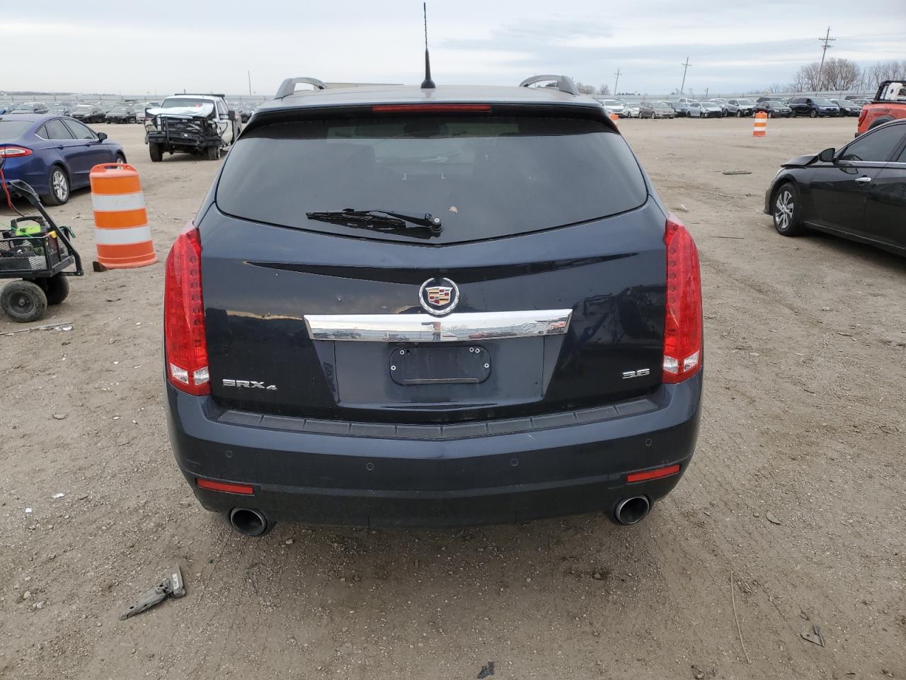 2014 Cadillac SRX VIN 3GYFNEE39ES680521 Copart auction photo, side damage thumbnail 6