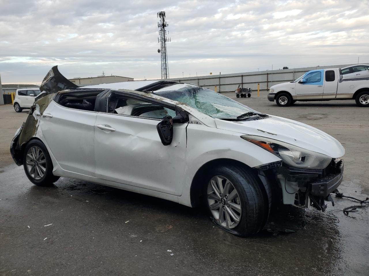 2015 Hyundai Elantra VIN 5NPDH4AE0FH587811 Copart auction photo, rollover / stripped damage thumbnail 4