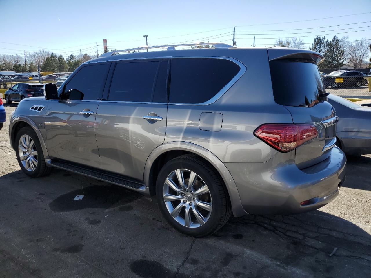2014 Infiniti QX80 VIN JN8AZ2NE0E9062824 Copart auction photo, undercarriage / minor dent/scratches damage thumbnail 2