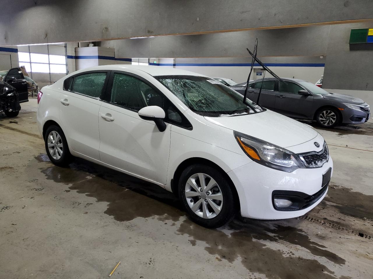 2013 KIA Rio VIN KNADN4A34D6232829 Copart auction photo, stripped / minor dent/scratches damage thumbnail 4