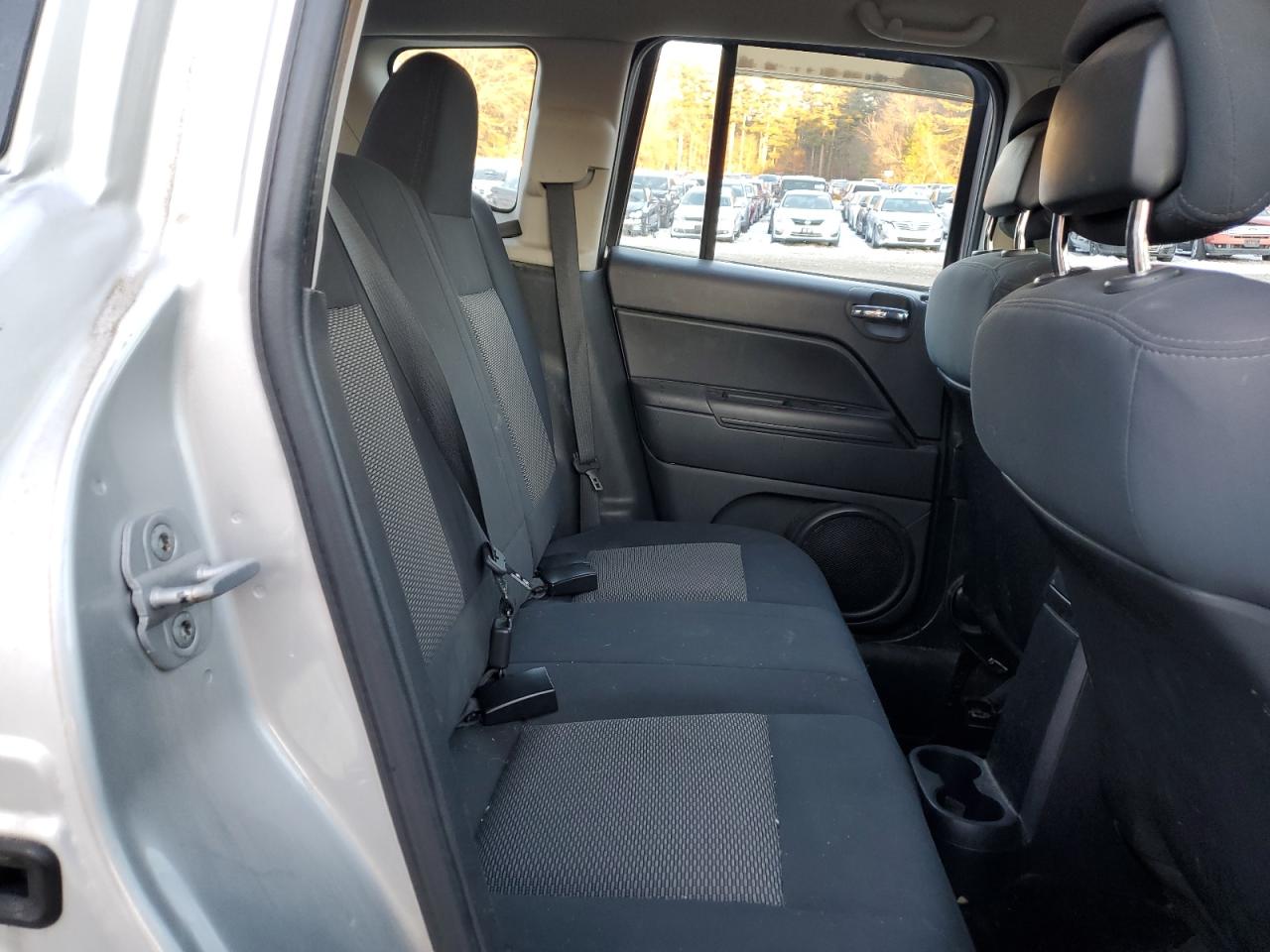 2010 Jeep Compass VIN 1J4NF4FB8AD601410 Copart auction photo, side / front end damage thumbnail 11