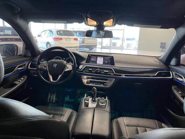 2018 BMW 7er VIN WBA7E2C50JG743251 Copart auction photo, minor dent/scratches / normal wear damage thumbnail 9