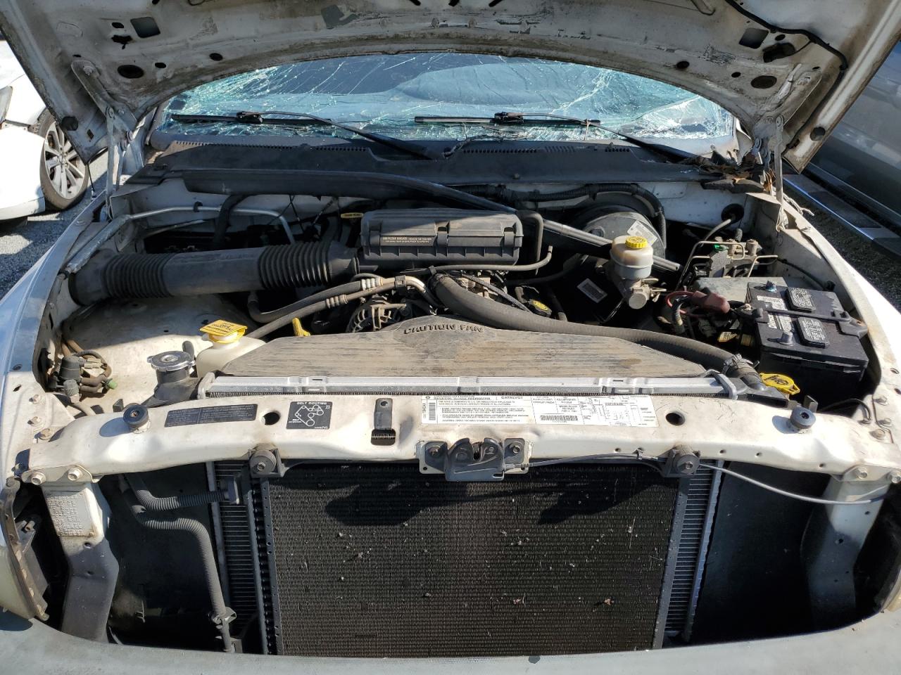 1999 Dodge RAM VIN 3B7HC12Y5XG197336 Copart auction photo, top/roof damage thumbnail 11