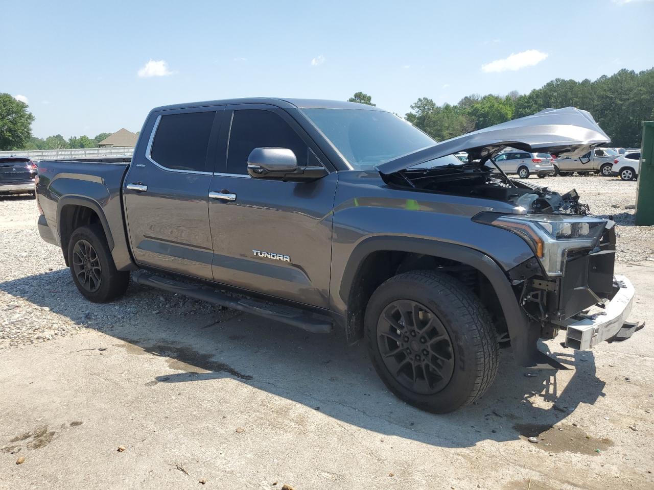 2023 Toyota Tundra VIN 5TFJA5DB2PX114108 Copart auction photo, front end / side damage thumbnail 4