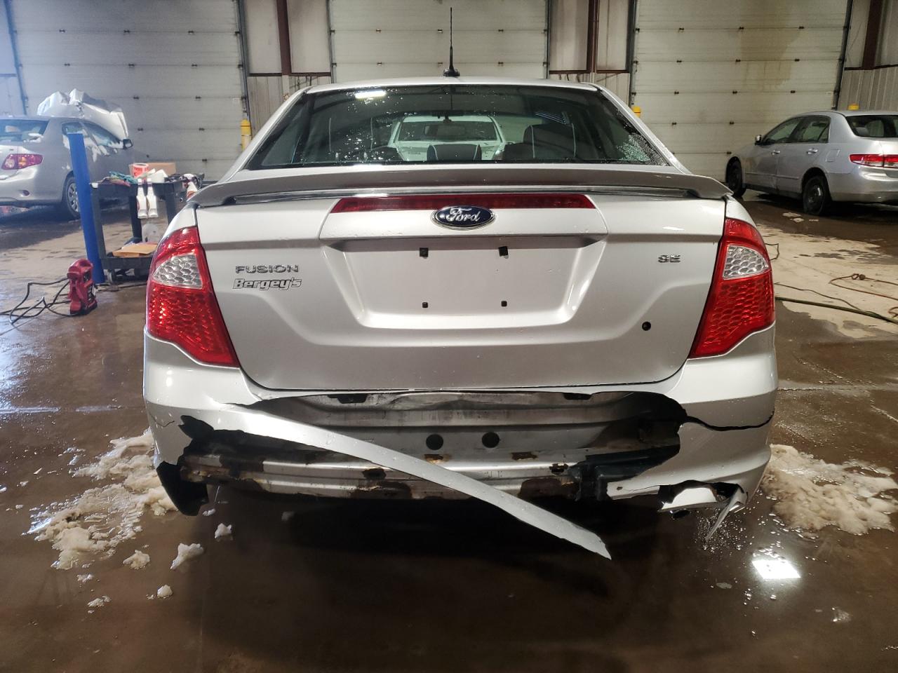 2012 Ford Fusion VIN 3FAHP0HA0CR347995 Copart auction photo, rear end damage thumbnail 6