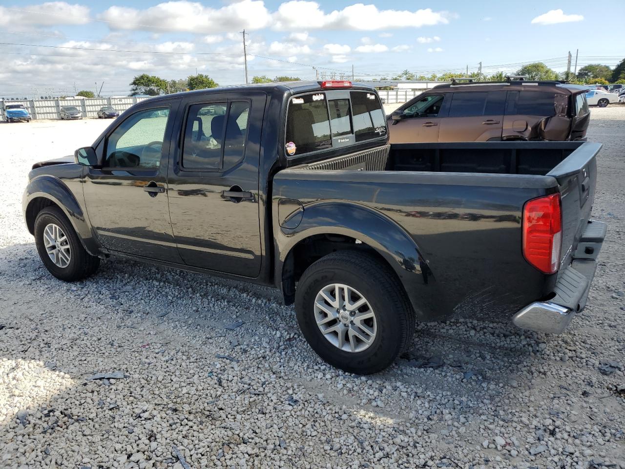 2019 Nissan Navara (Frontier) VIN 1N6AD0ER9KN710310 Copart auction photo, front end / minor dent/scratches damage thumbnail 2