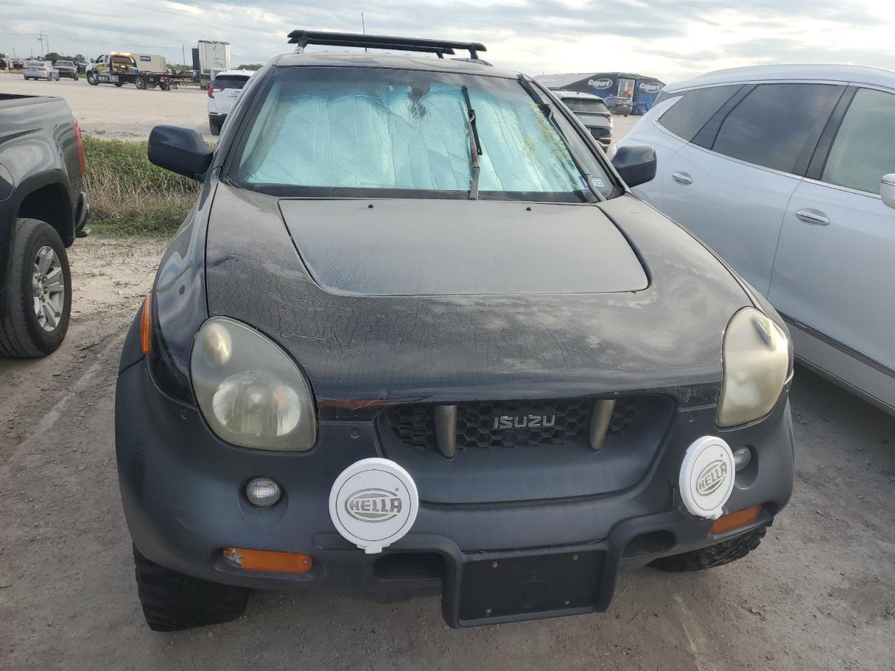 1999 Isuzu VehiCross VIN JACCN57X2X7991734 Copart auction photo, water/flood damage thumbnail 5