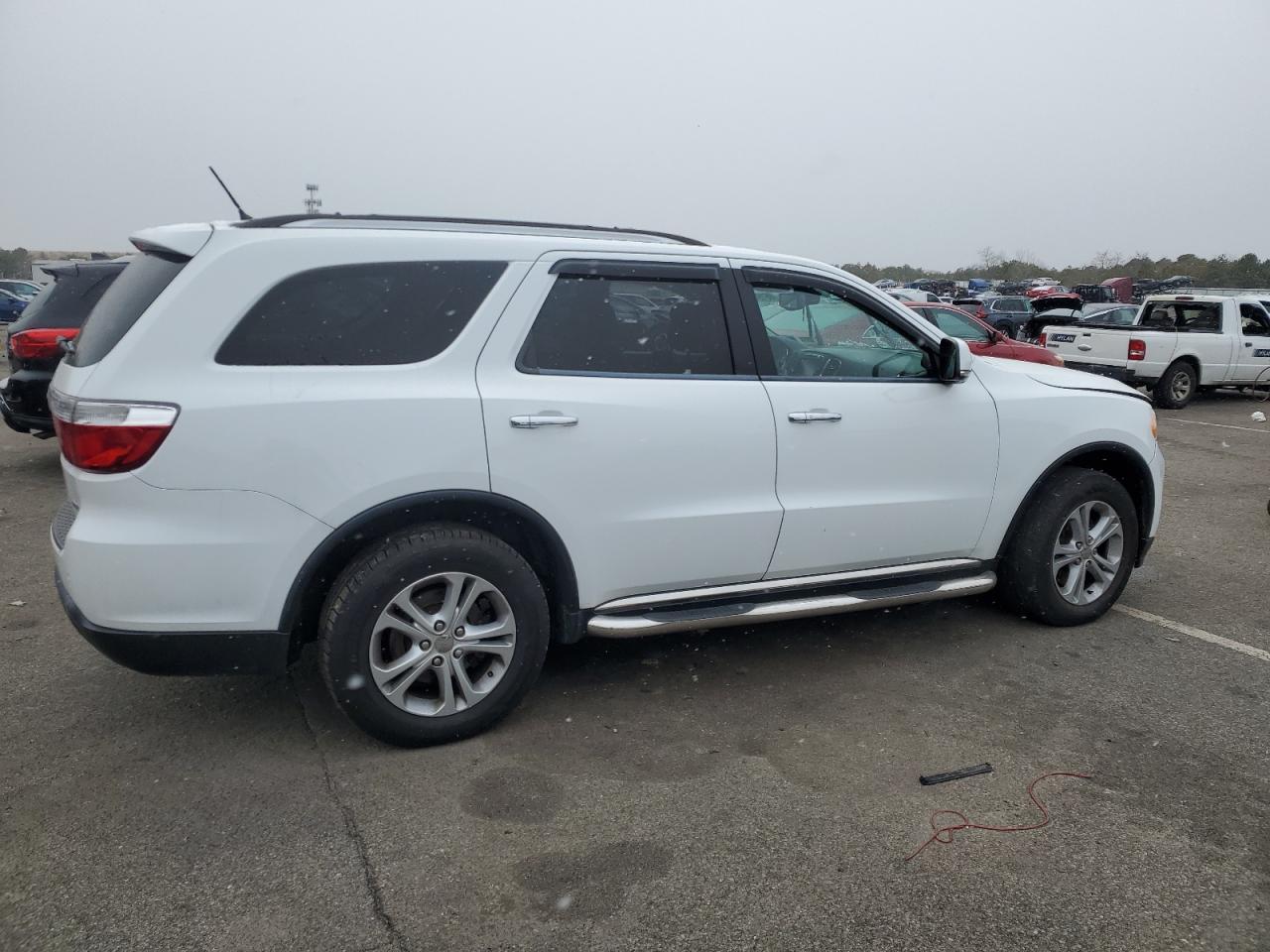 2013 Dodge Durango VIN 1C4SDJDT9DC672117 Copart auction photo, side / minor dent/scratches damage thumbnail 3