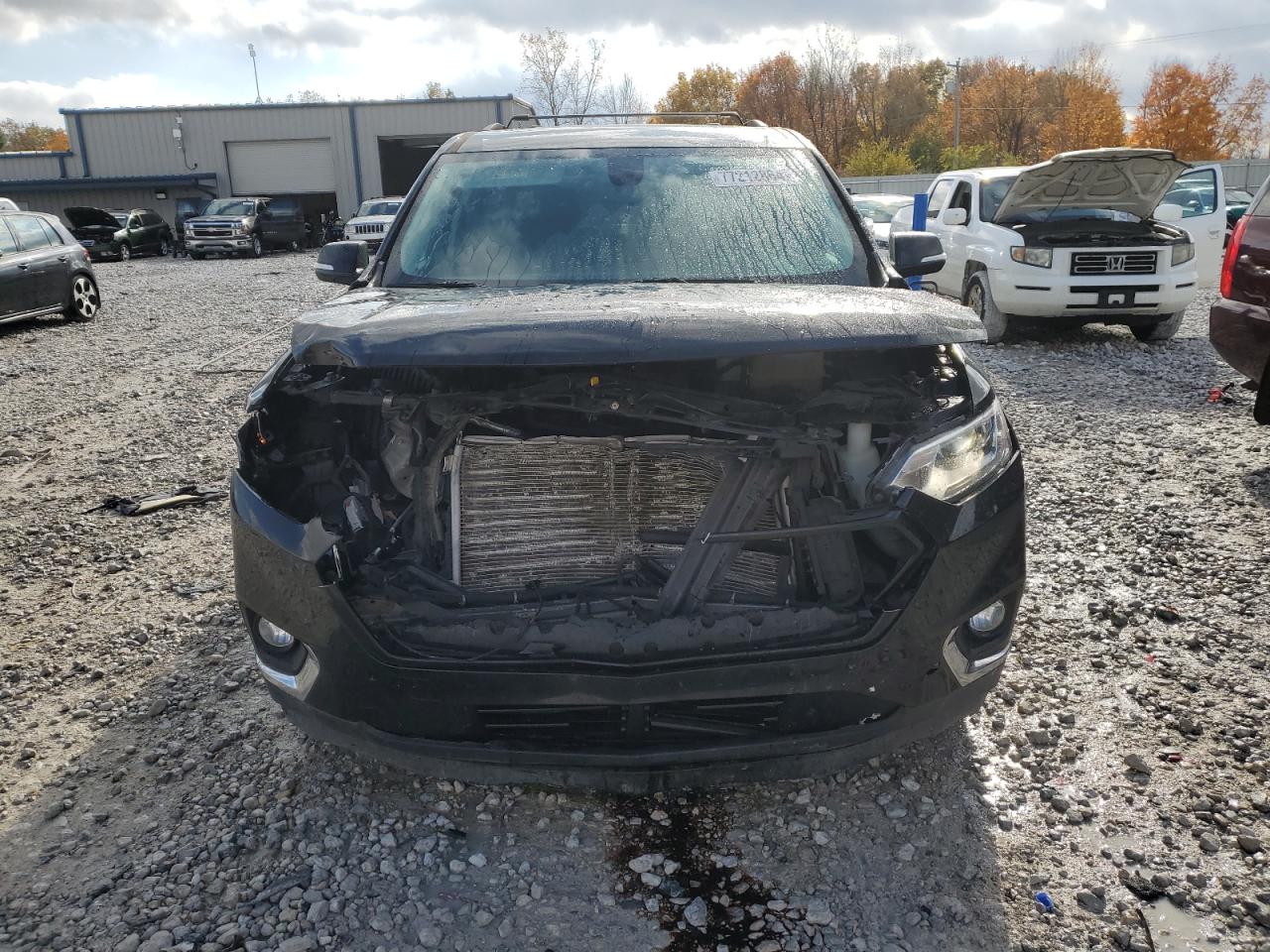 2018 Chevrolet Traverse VIN 1GNEVHKW0JJ234584 Copart auction photo, front end damage thumbnail 5