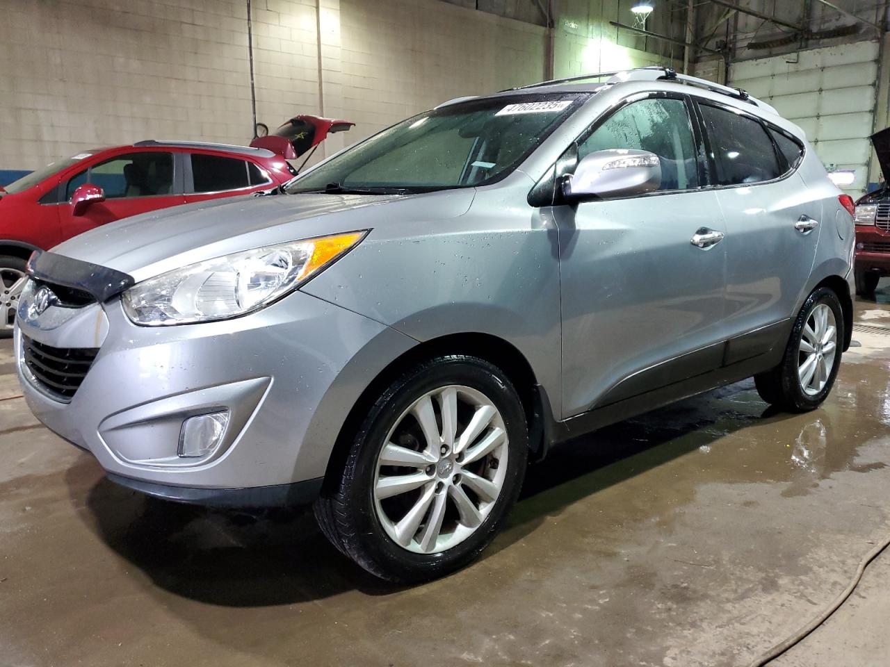 2012 Hyundai Tucson VIN KM8JUCAC5CU403256