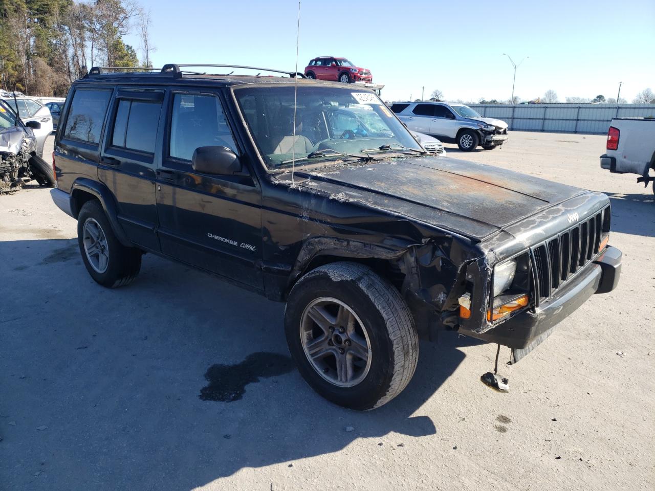 2000 Jeep Cherokee VIN 1J4FF58S3YL171454 Copart auction photo, all over damage thumbnail 4