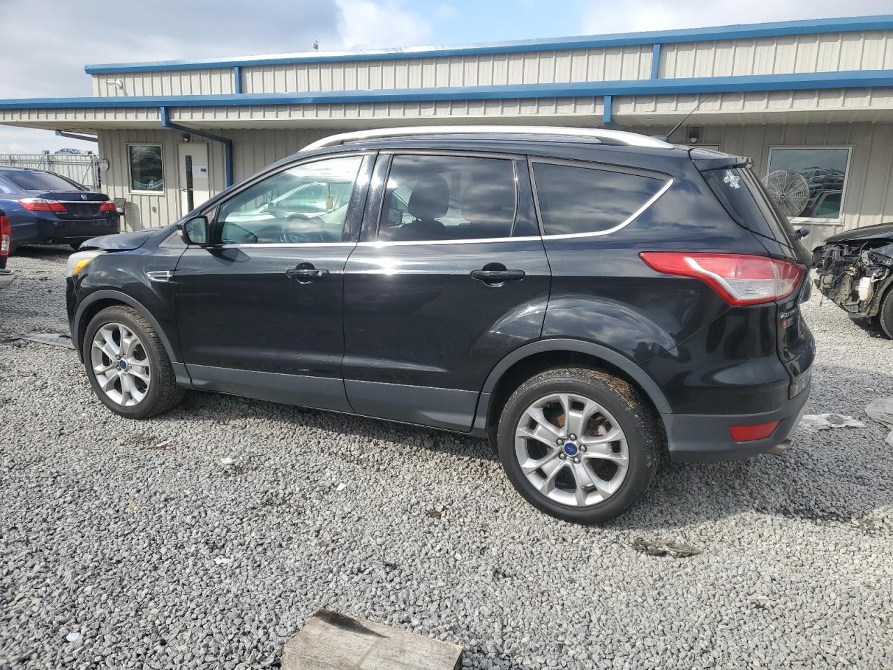2015 Ford Escape VIN 1FMCU9J91FUC82133 Copart auction photo, front end / minor dent/scratches damage thumbnail 2
