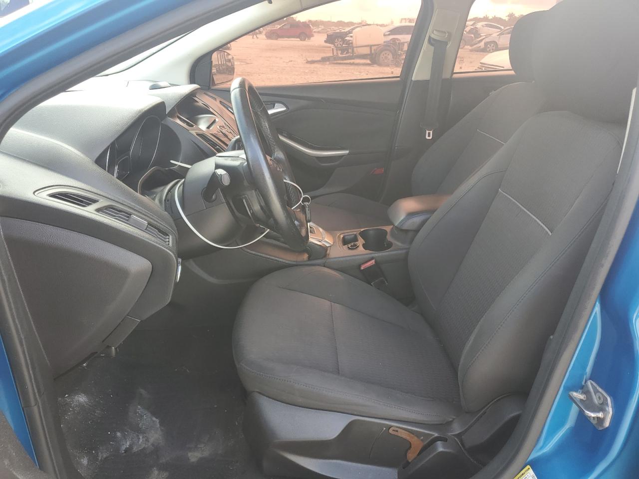 2012 Ford Focus VIN 1FAHP3H24CL397050 Copart auction photo, front end / minor dent/scratches damage thumbnail 7