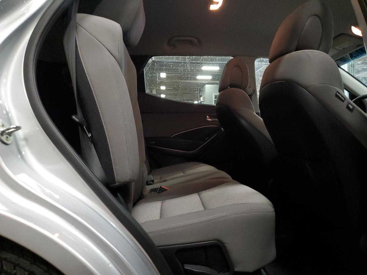 2018 Hyundai Santa Fe VIN 5XYZTDLB5JG570011 Copart auction photo, rear end damage thumbnail 11