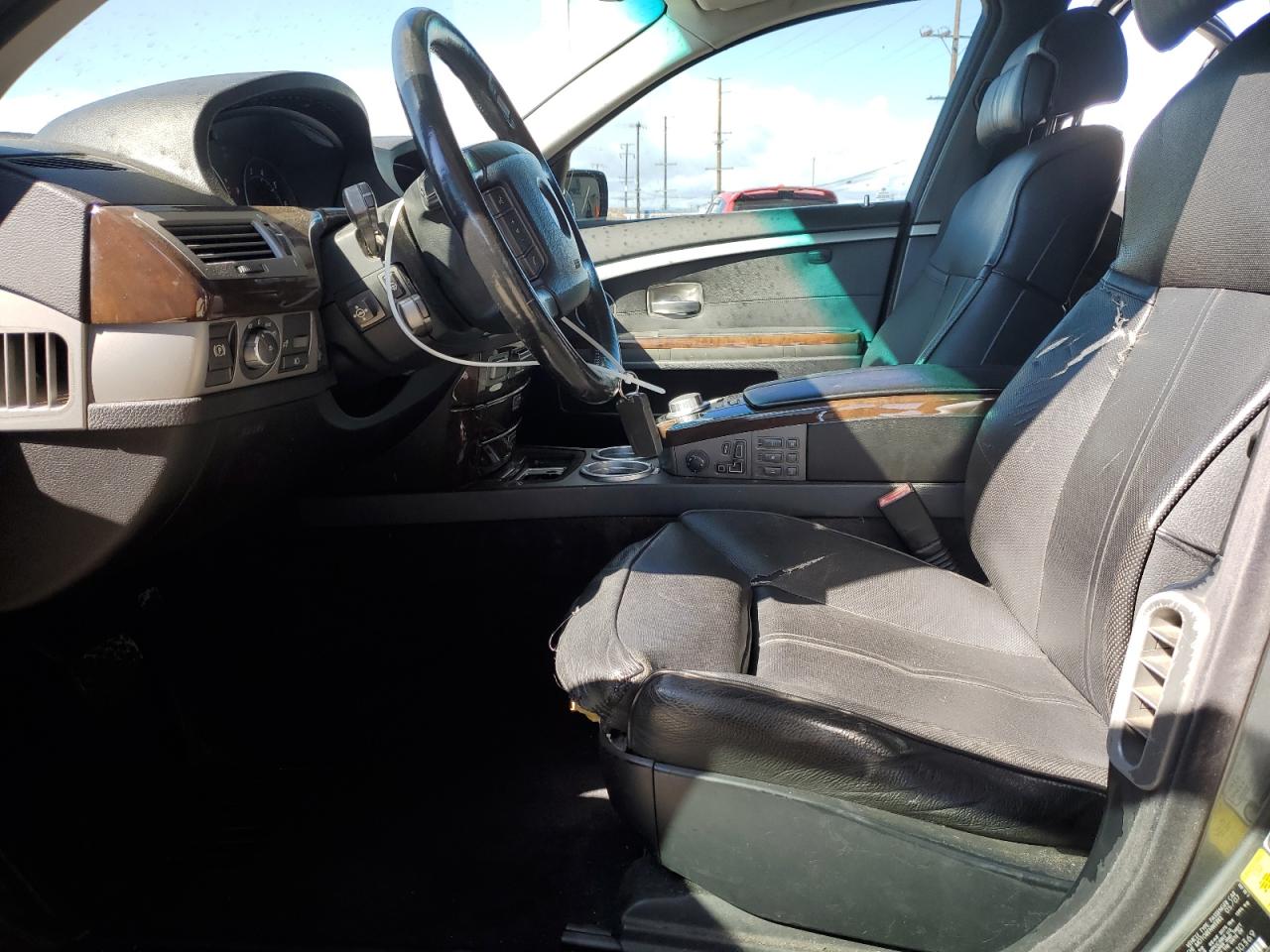 2007 BMW 7er VIN WBAHL83577DT10369 Copart auction photo, minor dent/scratches damage thumbnail 7