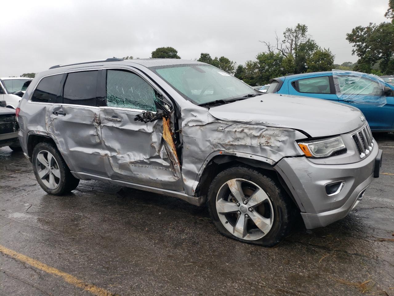 2015 Jeep Grand Cherokee VIN 1C4RJFCG1FC238088 Copart auction photo, all over damage thumbnail 4