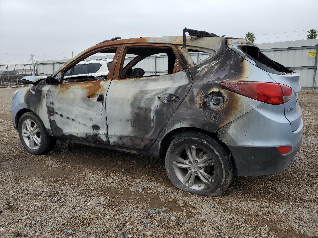 2012 Hyundai Tucson VIN KM8JU3AC8CU337995 Copart auction photo, burn - interior / burn damage thumbnail 2