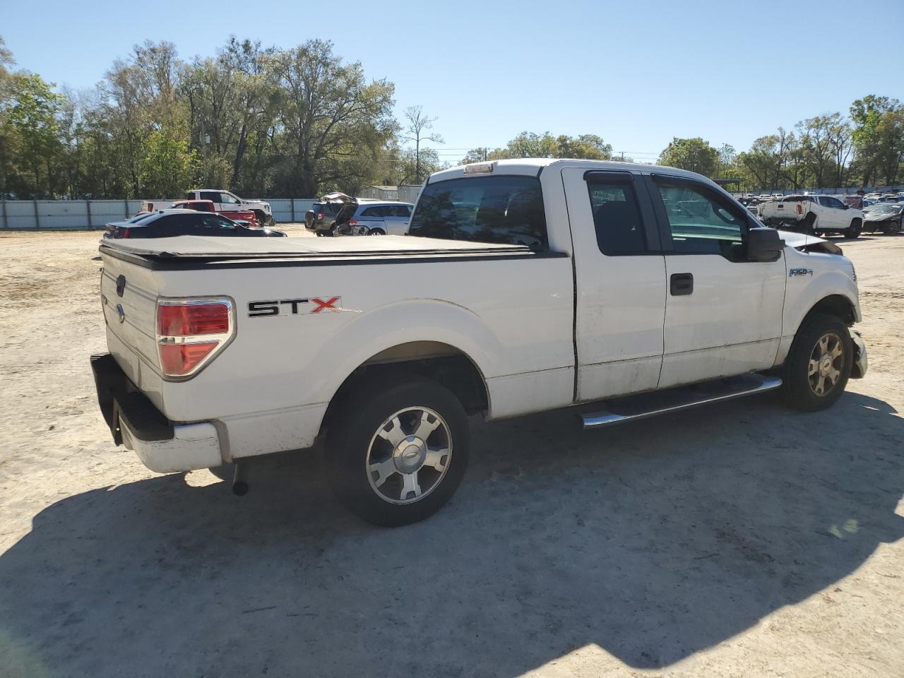 2010 Ford F-150 VIN 1FTEX1C85AFA84291 Copart auction photo, front end / minor dent/scratches damage thumbnail 3