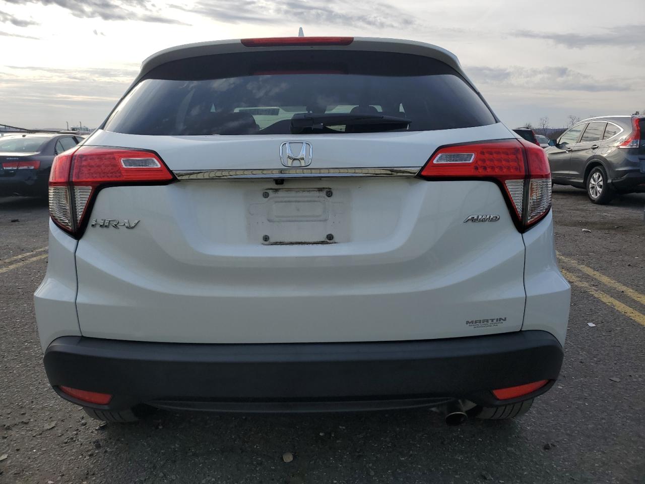 2019 Honda HR-V VIN 3CZRU6H59KM707008 Copart auction photo, side / front end damage thumbnail 6