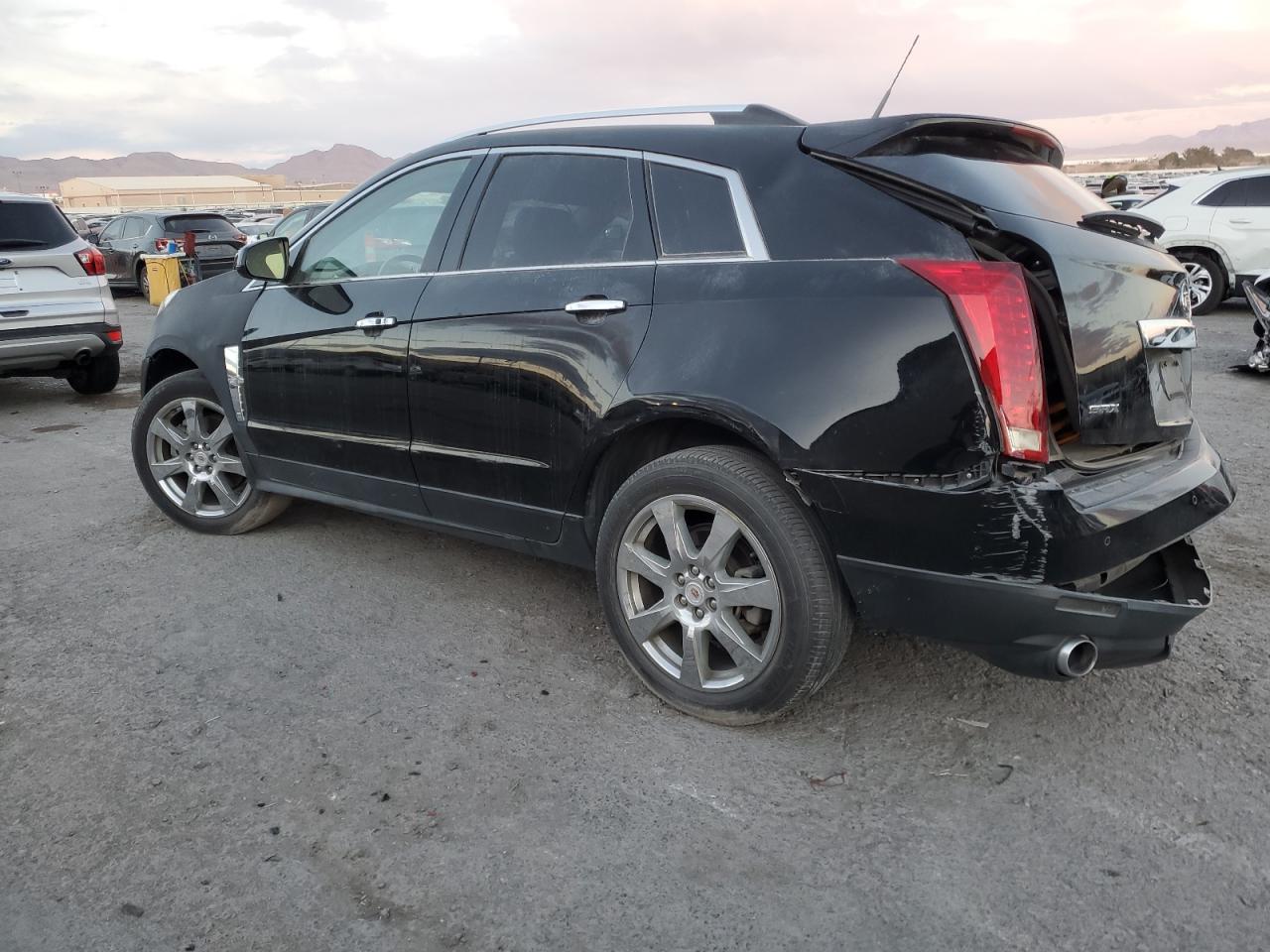 2012 Cadillac SRX VIN 3GYFNBE36CS578993 Copart auction photo, all over damage thumbnail 2