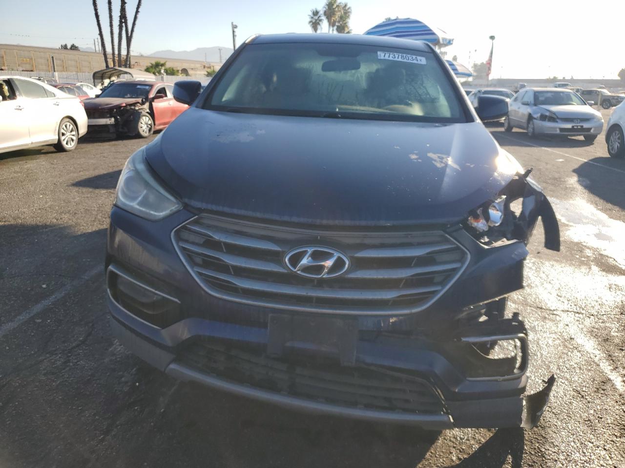 2017 Hyundai Santa Fe VIN 5XYZT3LBXHG499070 Copart auction photo, front end / undercarriage damage thumbnail 5