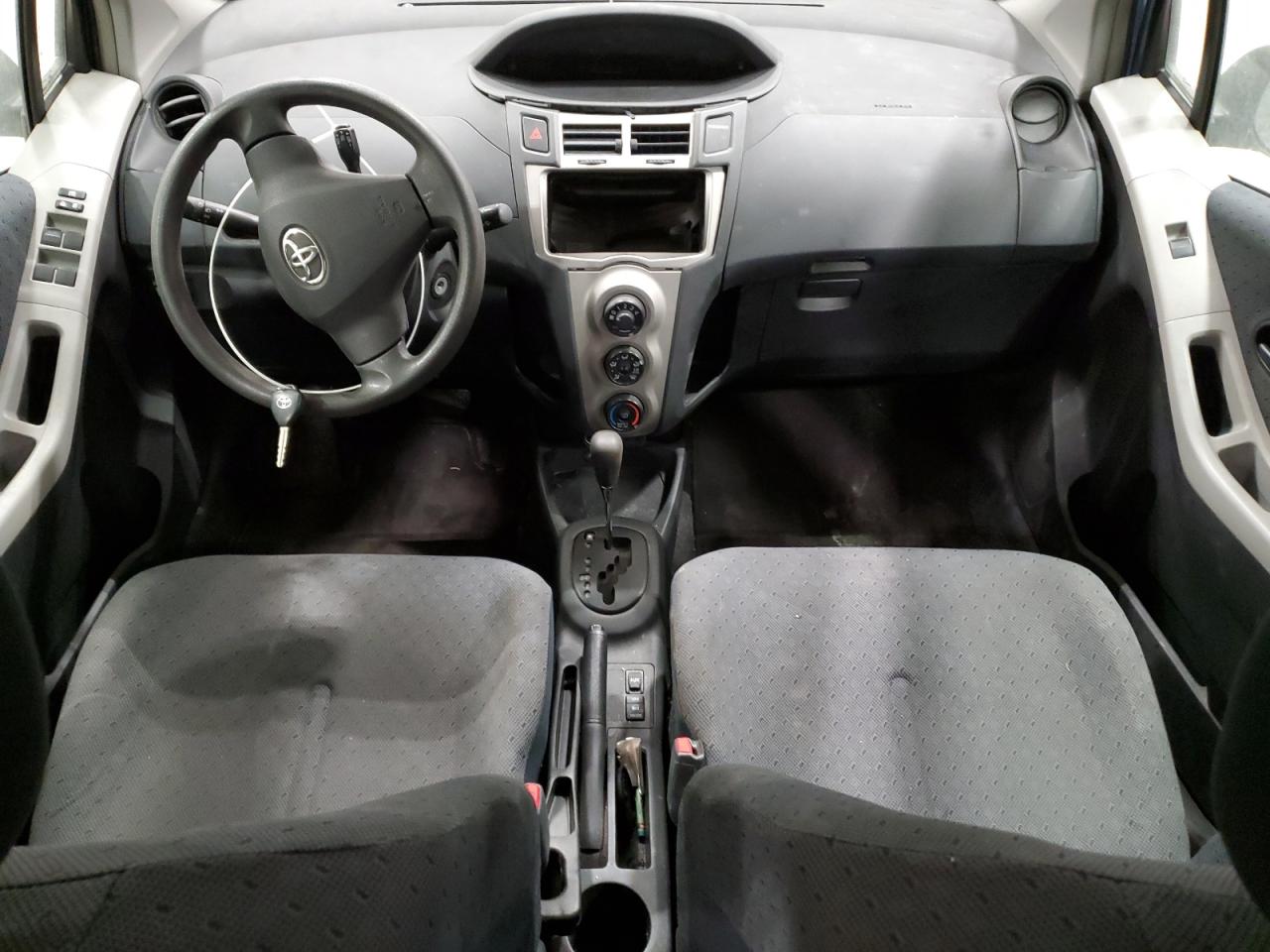 2009 Toyota Yaris VIN JTDKT903095240941 Copart auction photo, front end damage thumbnail 8