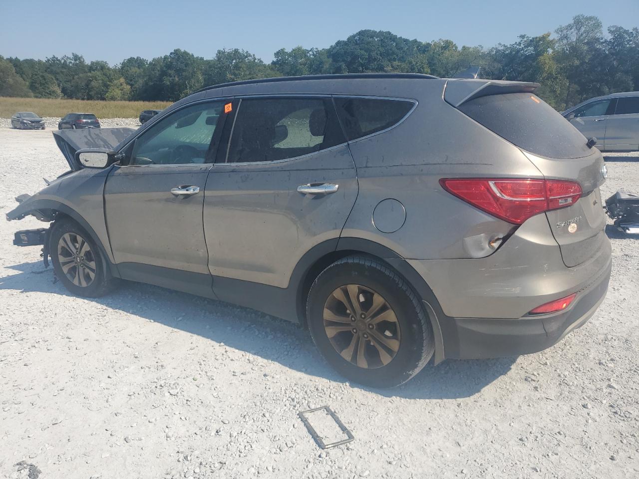 2015 Hyundai Santa Fe VIN 5XYZU3LB2FG254838 Copart auction photo, front end / side damage thumbnail 2