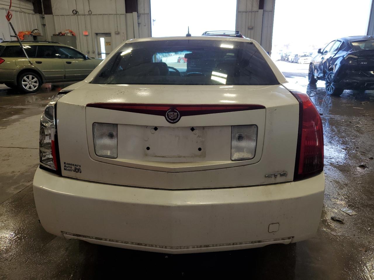 2006 Cadillac CTS VIN 1G6DP577060129803 Copart auction photo, rear end / side damage thumbnail 6