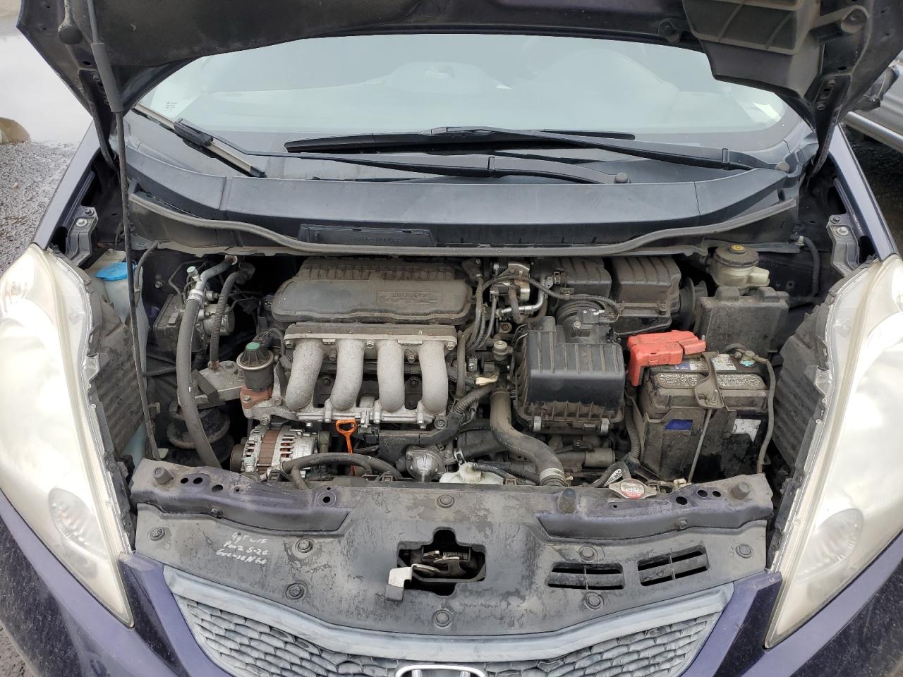 2010 Honda Fit VIN JHMGE8H41AC028247 Copart auction photo, side damage thumbnail 11