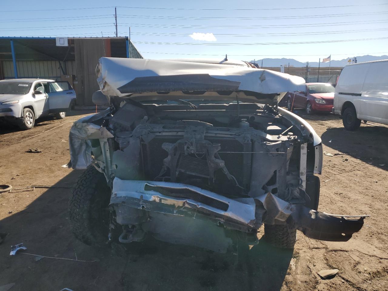 2012 Chevrolet Silverado VIN 3GCPKSE73CG185235 Copart auction photo, front end damage thumbnail 5