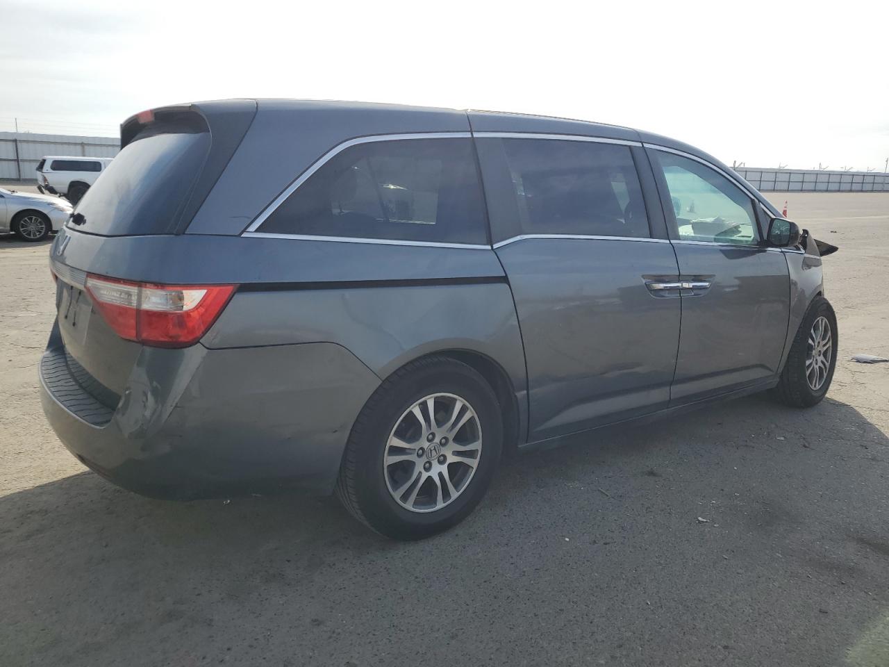 2012 Honda Odyssey VIN 5FNRL5H47CB065761 Copart auction photo, front end / side damage thumbnail 3
