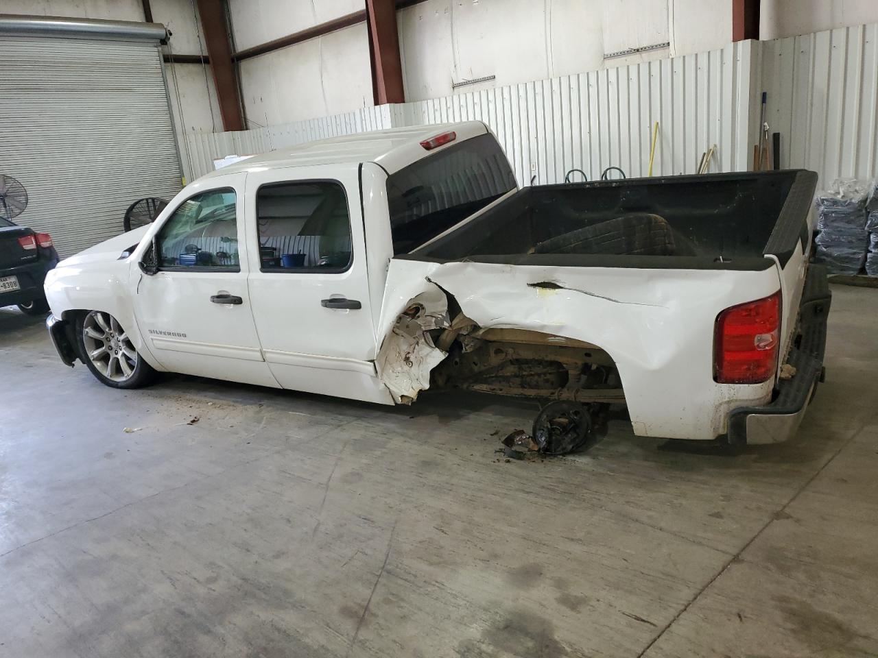 2012 Chevrolet Silverado VIN 3GCPCSEA5CG119049 Copart auction photo, side / front end damage thumbnail 2