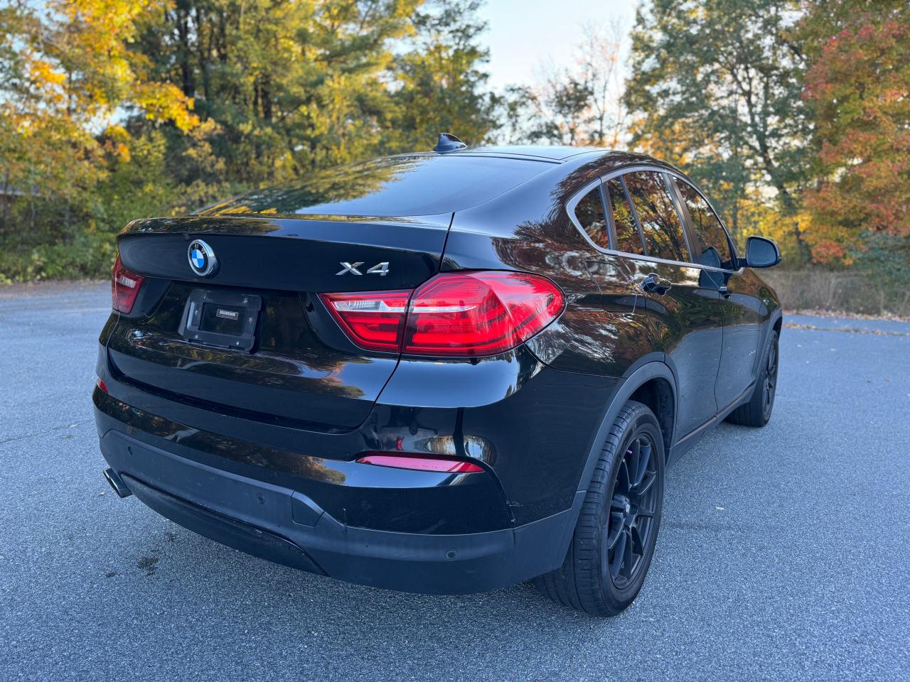 2015 BMW X4 VIN 5UXXW3C56F0M86780 Copart auction photo, normal wear / minor dent/scratches damage thumbnail 4