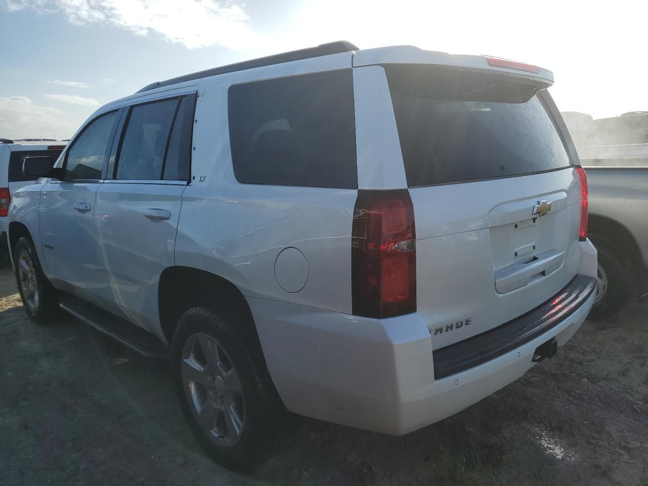 2017 Chevrolet Tahoe VIN 1GNSCBKC9HR322444 Copart auction photo, water/flood damage thumbnail 2